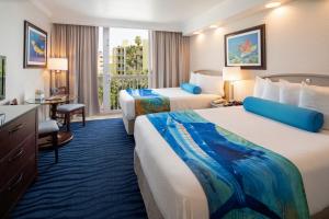 Double Suite with Courtyard View Recently Renovated room in RumFish Beach Resort by TradeWinds