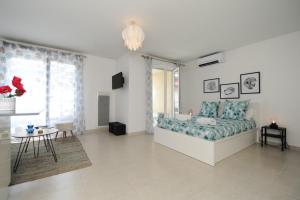 Appartements Mini suite Othello - Five Stars Holiday House : photos des chambres