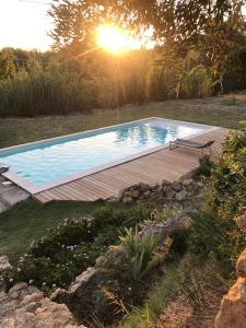 Maisons d'hotes Maisonnette et piscine : photos des chambres