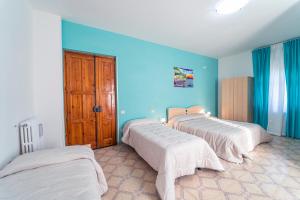 Chambre Quadruple avec Balcon