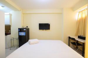 Studio Room @ Tifolia Apartment near Kelapa Gading By Travelio