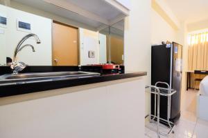 Studio Room @ Tifolia Apartment near Kelapa Gading By Travelio