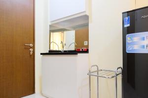 Studio Room @ Tifolia Apartment near Kelapa Gading By Travelio