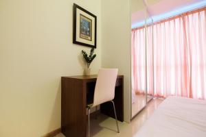 Homey 2BR Apartment at Casa Grande Residence By Travelio