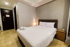 Luxurious Studio at Menteng Park Apartment By Travelio
