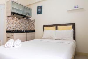 Cozy Studio Apartment Connected to Mall at Green Pramuka City By Travelio