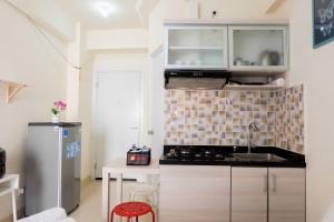Cozy Studio Apartment Connected to Mall at Green Pramuka City By Travelio
