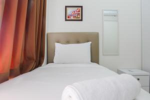 Exclusive 2BR Springlake Summarecon Bekasi Apartment By Travelio