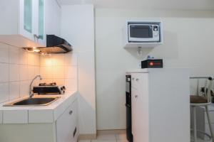 Exclusive 2BR Springlake Summarecon Bekasi Apartment By Travelio