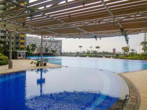 Exclusive 2BR Springlake Summarecon Bekasi Apartment By Travelio