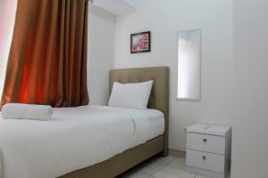 Exclusive 2BR Springlake Summarecon Bekasi Apartment By Travelio