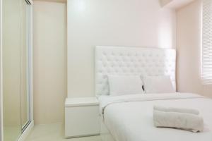 Simply 2BR at Bassura City Apartment By Travelio