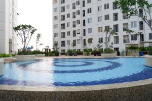 Simply 2BR at Bassura City Apartment By Travelio
