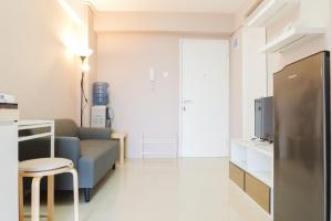 Simply 2BR at Bassura City Apartment By Travelio