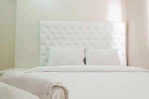 Simply 2BR at Bassura City Apartment By Travelio