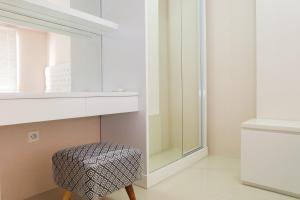 Simply 2BR at Bassura City Apartment By Travelio