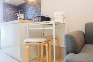 Simply 2BR at Bassura City Apartment By Travelio