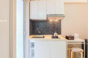 Simply 2BR at Bassura City Apartment By Travelio