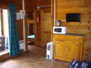 Campings LES CHALETS DE MONTORGUEIL : photos des chambres