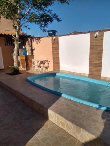 Casa com piscina e churrasqueira em Iguaba grande