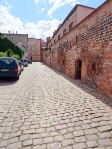 Mur 4 - Apartament z patio