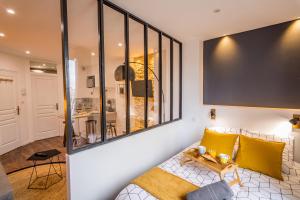 Appartements MON LOFT NIORTAIS - LE PETIT BOINOT : photos des chambres