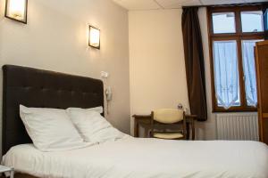 Hotels Hotel du commerce : photos des chambres