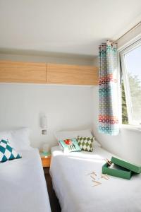 Campings Camping OAKi : photos des chambres