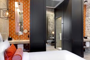 Hotels Boutique Hotel des Remparts & Spa : photos des chambres