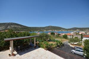 Two-Bedroom Apartment with Terrace and Sea View room in Apartments with a parking space Vinisce Trogir - 14407