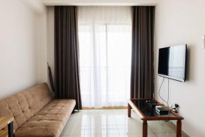 Nice 1BR Apartment at M-Town Signature By Travelio