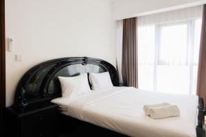 Nice 1BR Apartment at M-Town Signature By Travelio