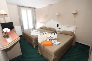 Hotels Hotel Des Arenes : photos des chambres