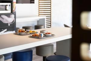 Hotels ibis budget Saint-Etienne Centre Gare Chateaucreux : photos des chambres