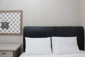 Scenic 2BR Apartment at Parahyangan Residence near UNPAR By Travelio