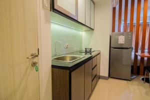Elegant 1BR at Grand Kamala Lagoon Apartment By Travelio