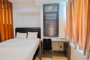 Elegant 1BR at Grand Kamala Lagoon Apartment By Travelio