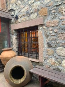 wood and stone in the path of lava Lesvos Greece