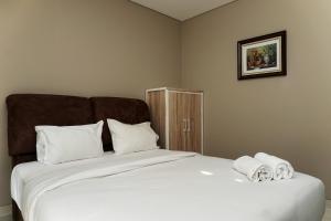 Exclusive 1BR Ciputra International Apartment By Travelio