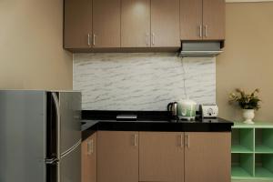 Exclusive 1BR Ciputra International Apartment By Travelio