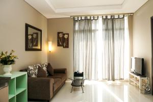 Exclusive 1BR Ciputra International Apartment By Travelio