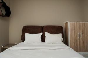 Exclusive 1BR Ciputra International Apartment By Travelio