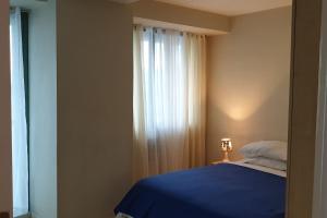 MANDALUYONG 2 Br w 2 Queen, 50HDtv across Shangrila Mall