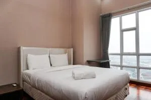 Fabulous 2BR Apartment Lucky Tower Residence By Travelio - Muarakarang