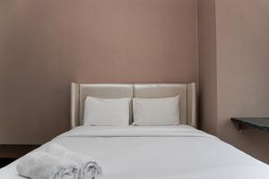 Fabulous 2BR Apartment Lucky Tower Residence By Travelio