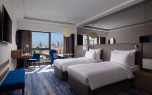 Premium Twin Room with City View room in Radisson Blu Olympiyskiy Hotel