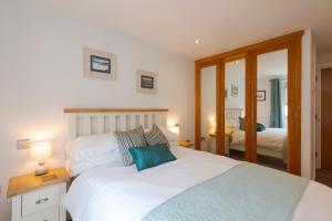 The Beach House & Porth Sands Apartments