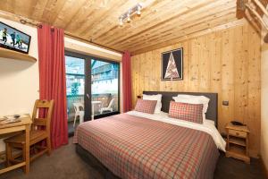 Hotels Hotel-Chalet Les Ecureuils Jardin, Piscine, Sauna : photos des chambres