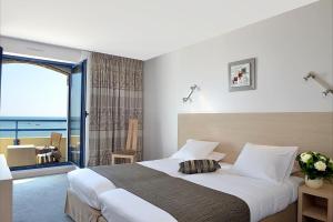 Hotels Hotel De La Plage : photos des chambres