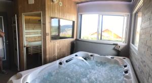 Chalets le bleu du lac Sauna et Spa : photos des chambres